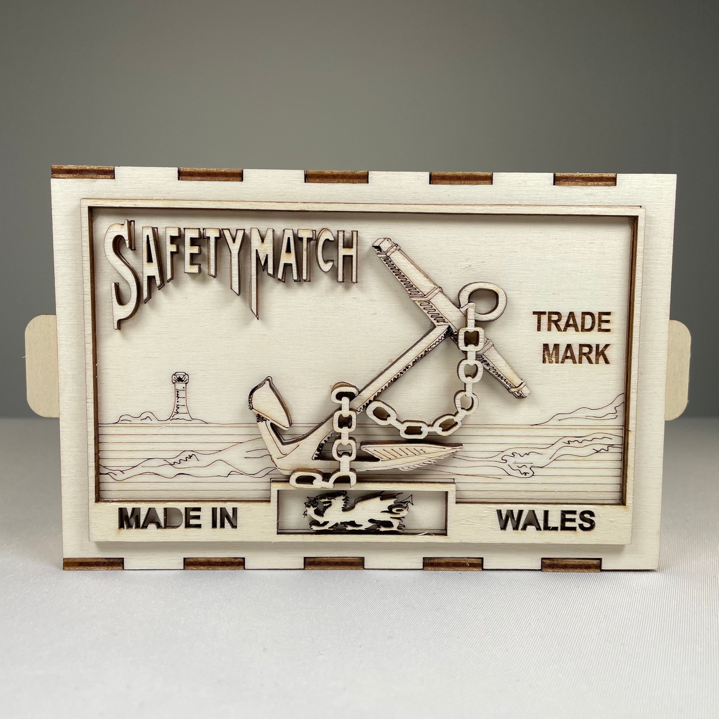 Vintage Curious Rabbit Matchbox (Anchor) flatpack model kit with detailed packaging and assembled miniature boat on a white background.