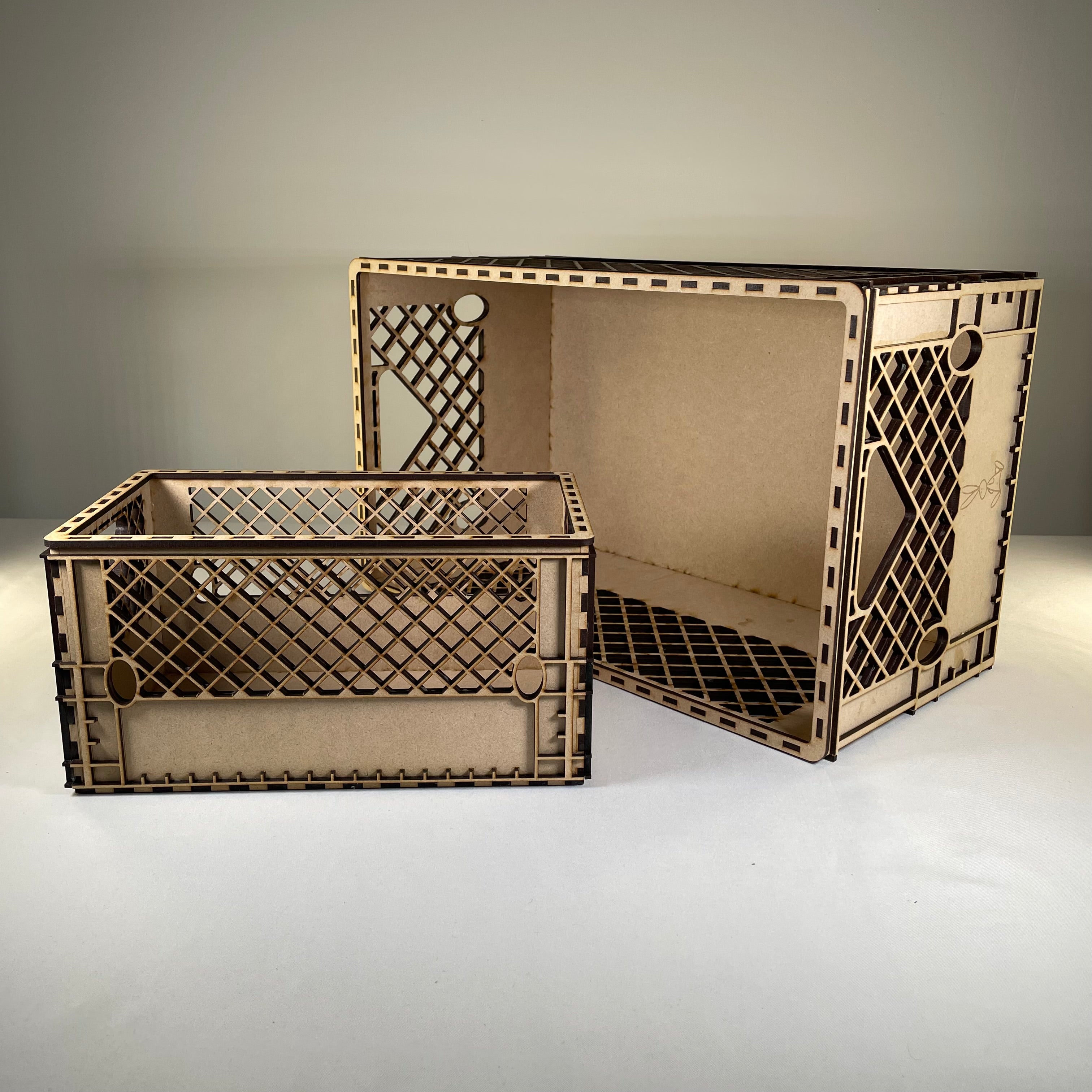 Vintage Curious Rabbit milk crate flatpack model kit, showing assembled wooden crate with slatted sides and sturdy construction.