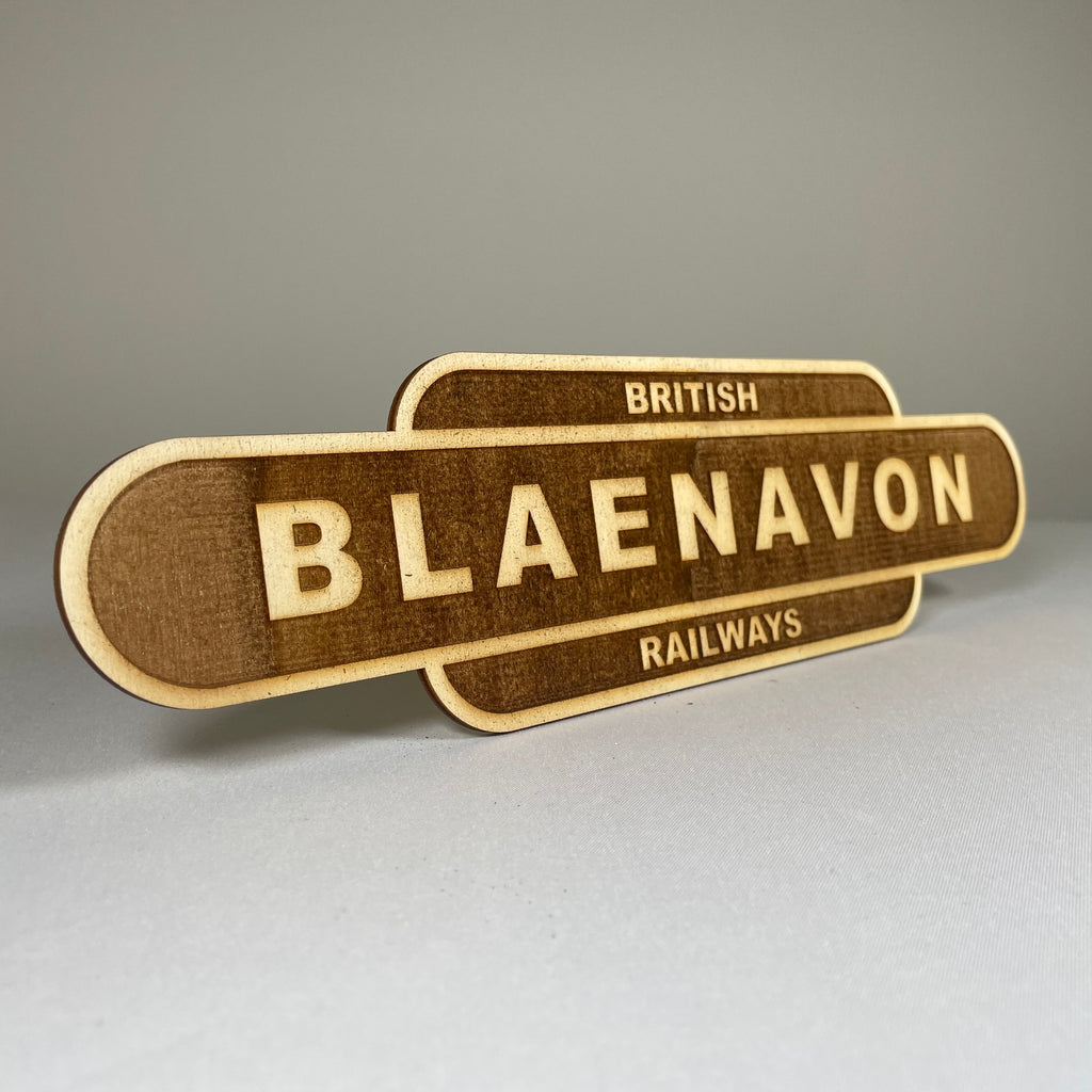 Handmade railway train station sign ornament by Curious Rabbit, featuring vintage-style railway station lettering and design.