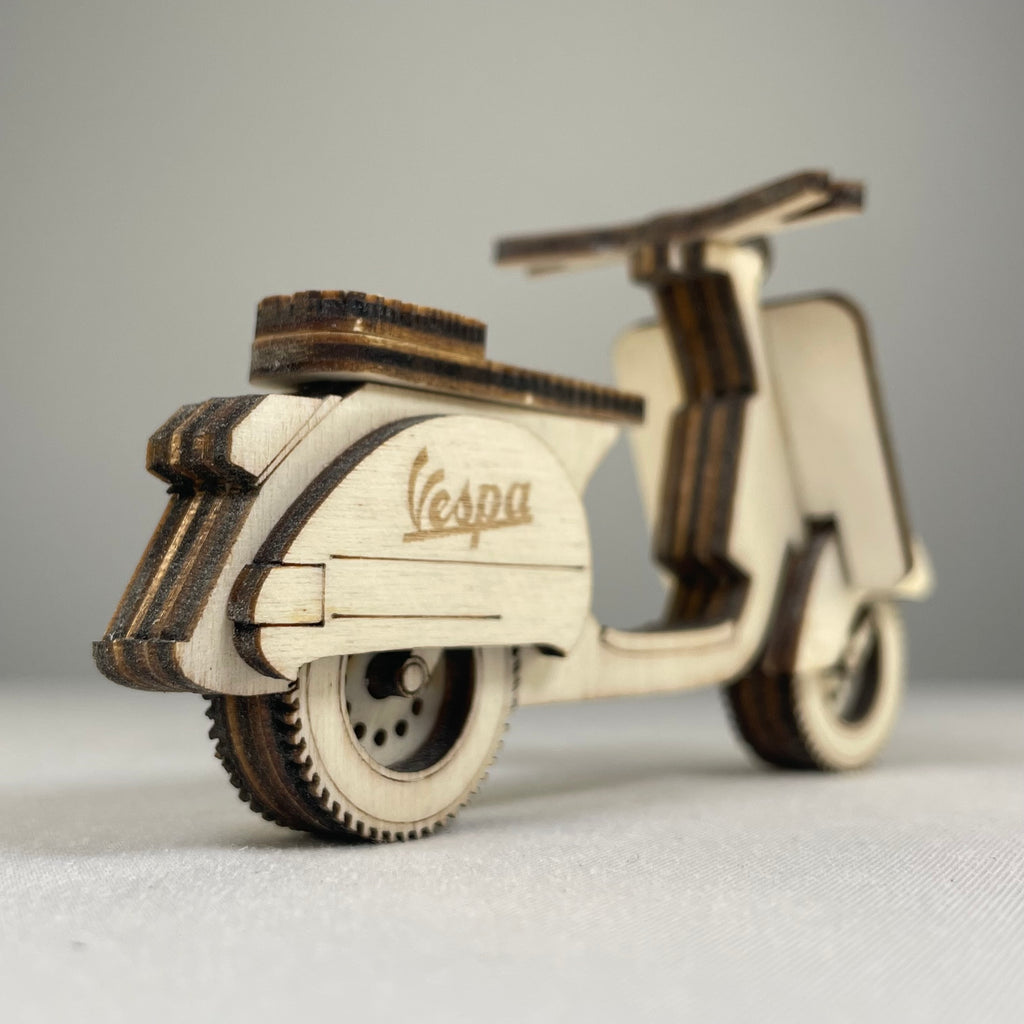 Vintage handmade Curious Rabbit retro scooter bauble ornament with intricate details, perfect for vintage-themed holiday decor.