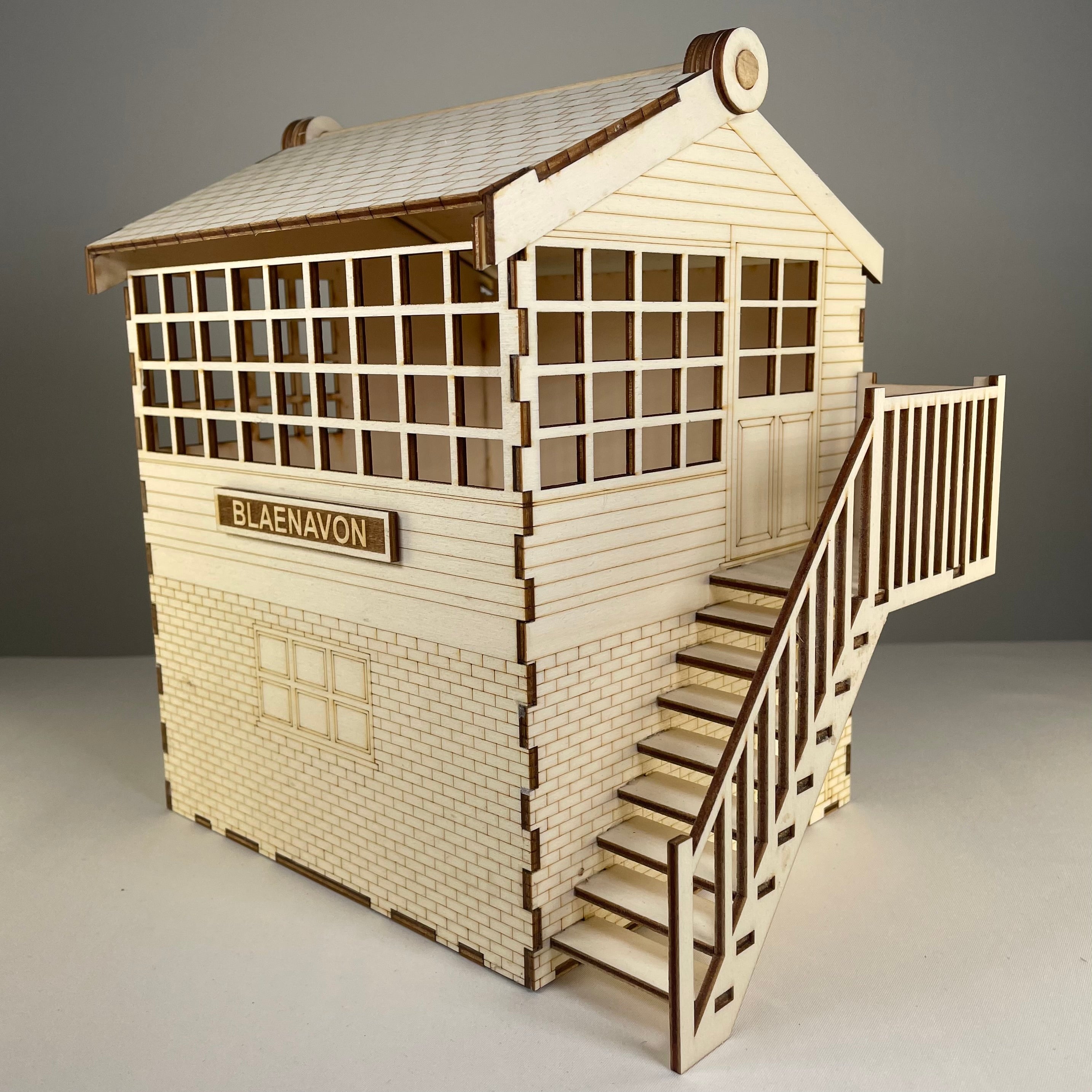 Curious Rabbit railway signal box flatpack model kit with detailed components, perfect for model railway enthusiasts.