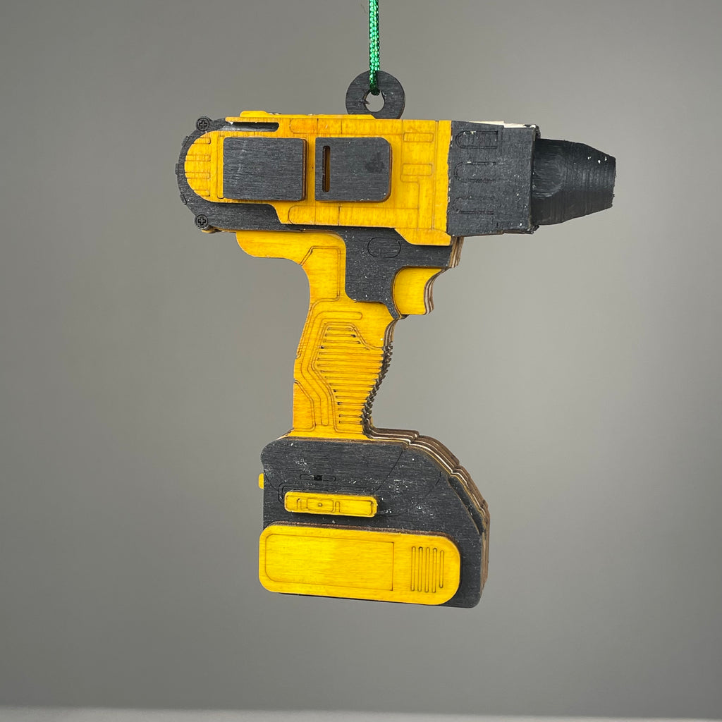 Handmade Curious Rabbit Power Drill Bauble ornament resembling a toolbox, with detailed craftsmanship and vibrant colors.