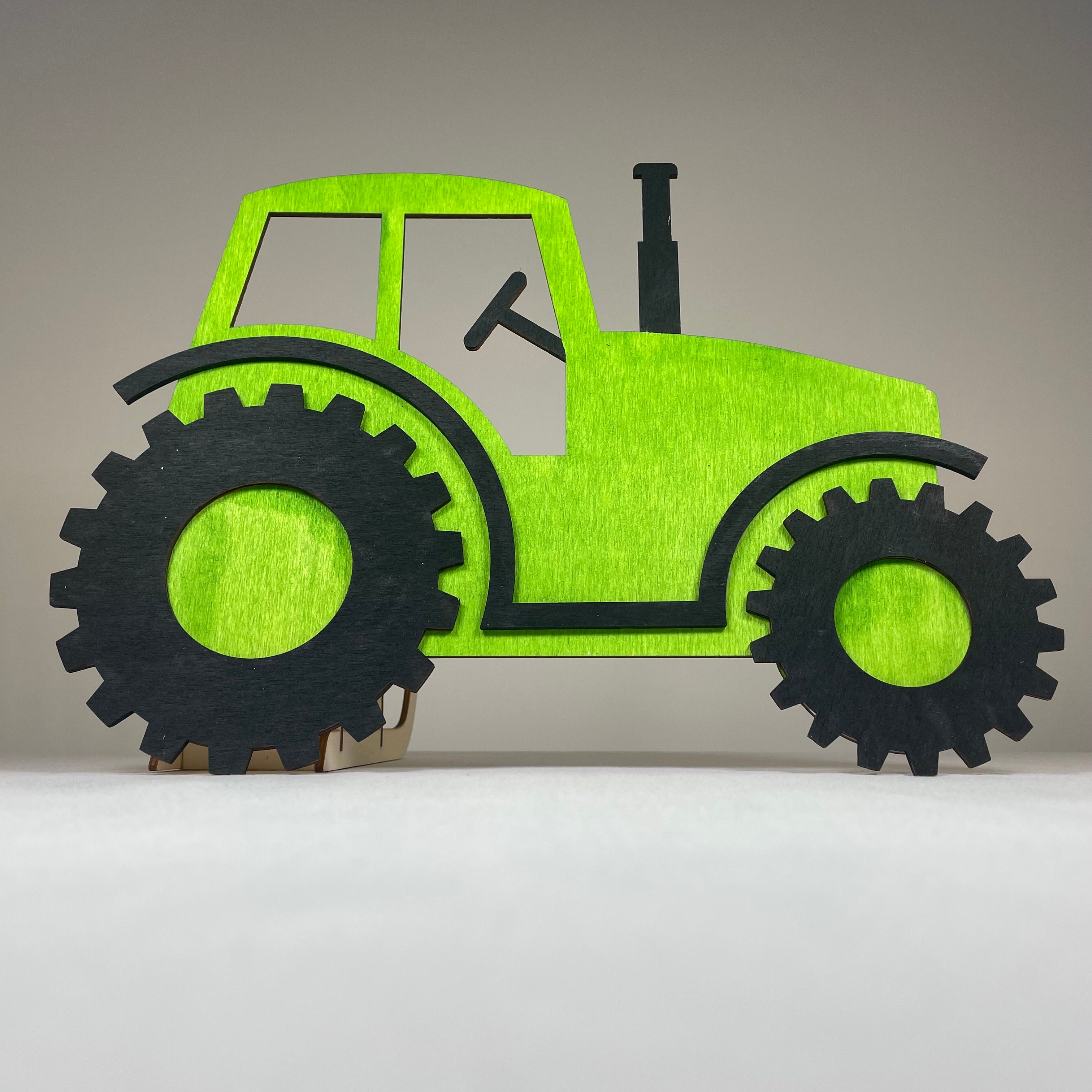 Handmade Curious Rabbit tractor-shaped garden wall display sign with rustic wood finish and vintage charm.