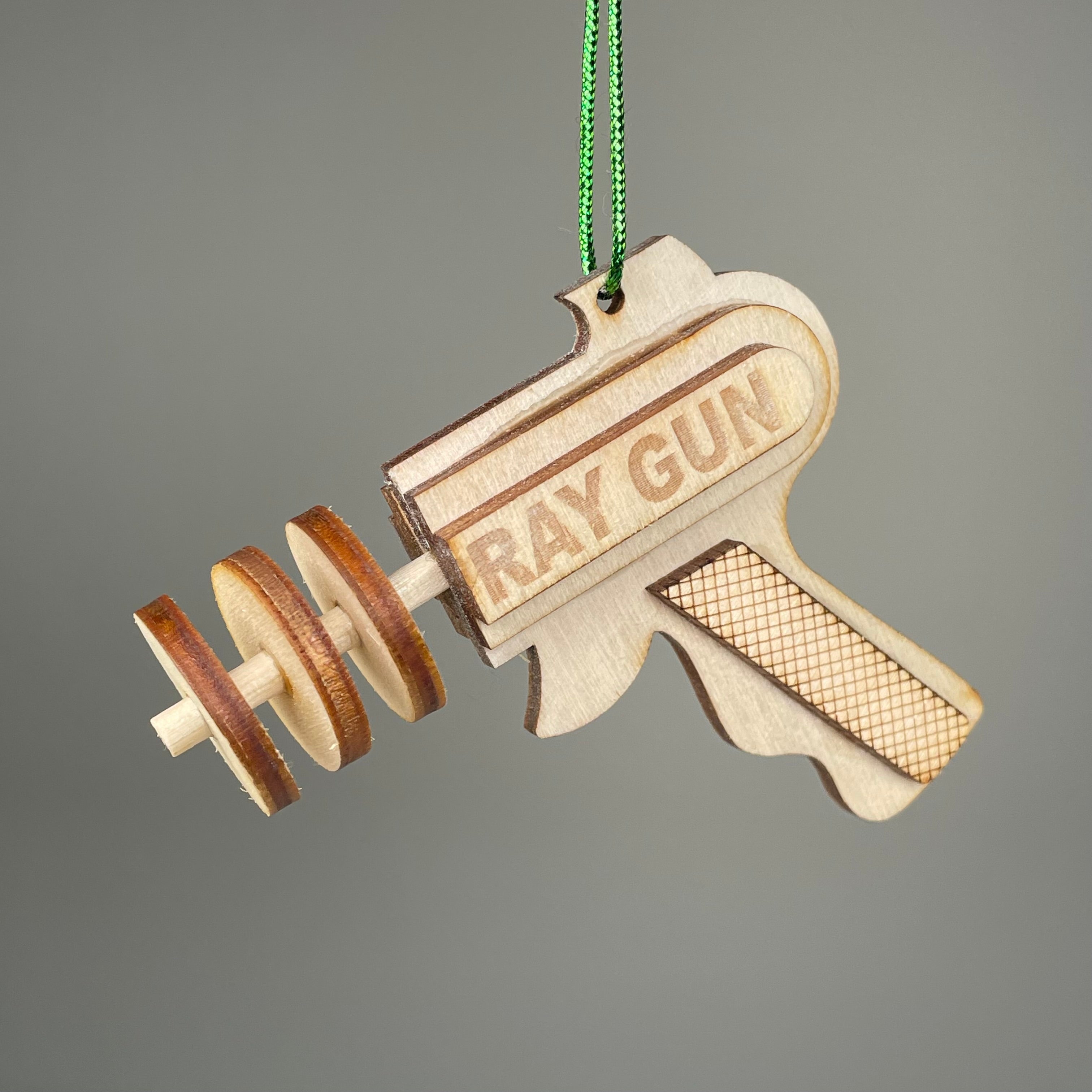 Vintage Ray Gun Bauble flatpack model kit by Curious Rabbit, detailed miniature space-themed collectible with intricate design.