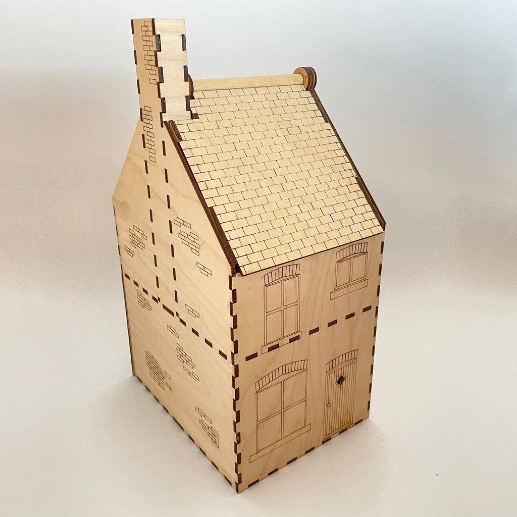 Detailed image of Curious Rabbit Victorian Terraced House flatpack model kit showcasing 19th-century architecture with intricate design.
