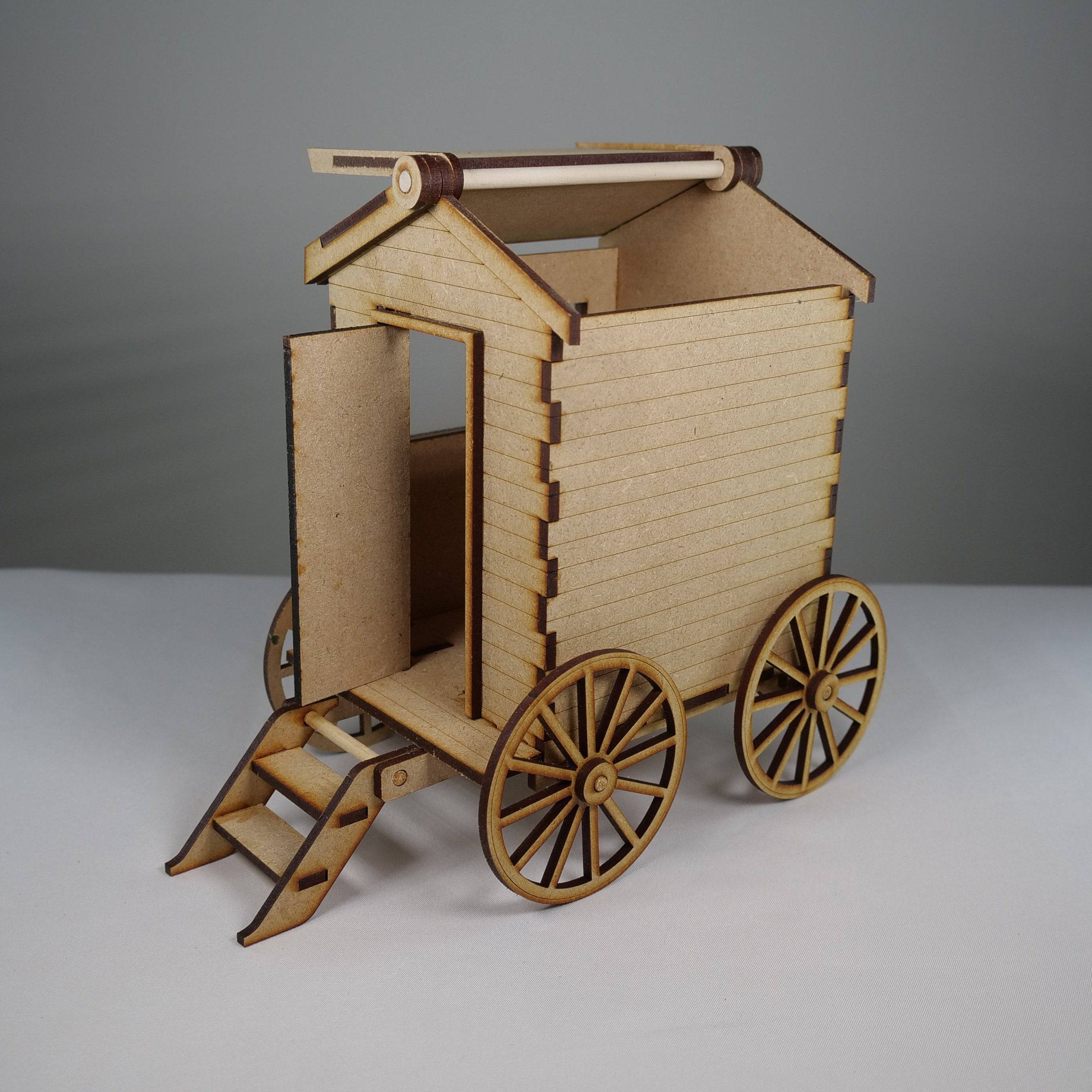Curious Rabbit Beach Bathing Hut flatpack model kit with detailed beach scene and miniature hut in natural setting.