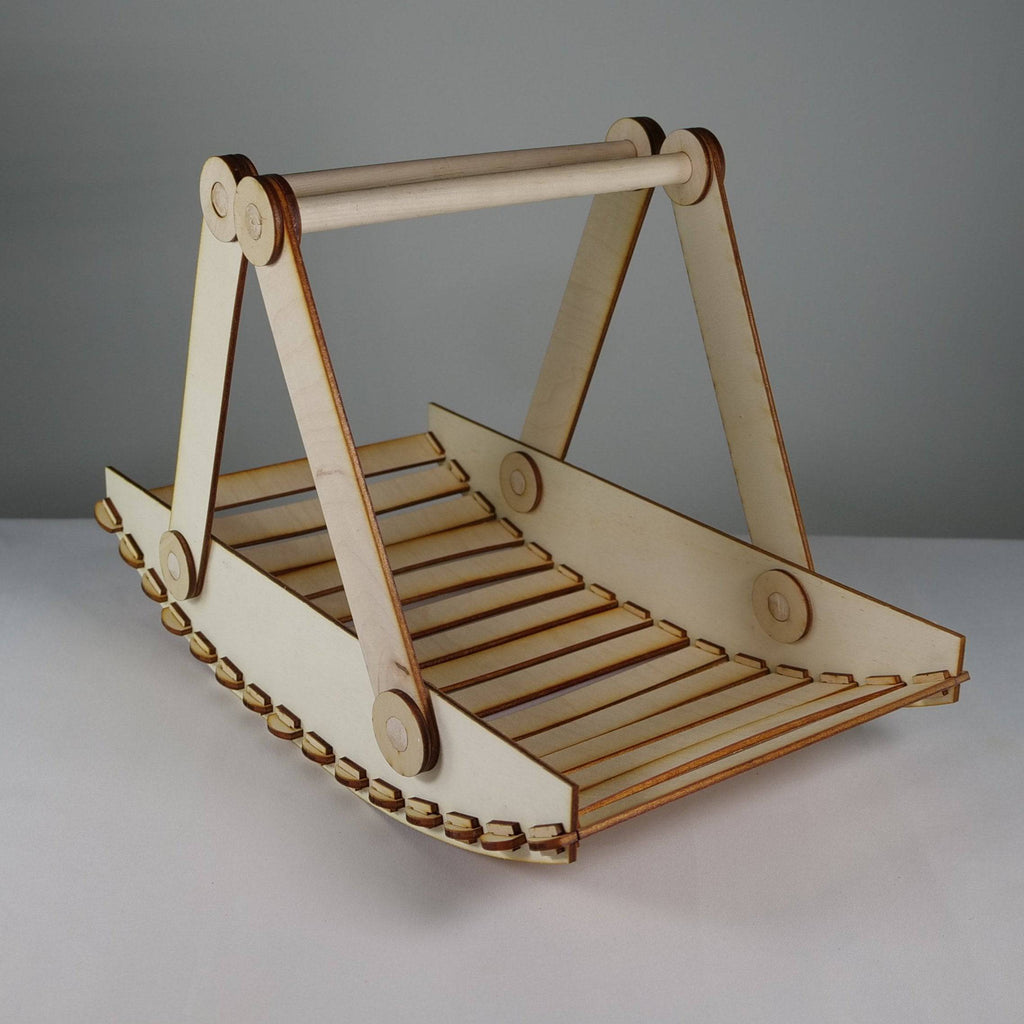 Curious Rabbit garden Trug picnic basket flatpack model kit with wooden handle and woven basket for outdoor use.
