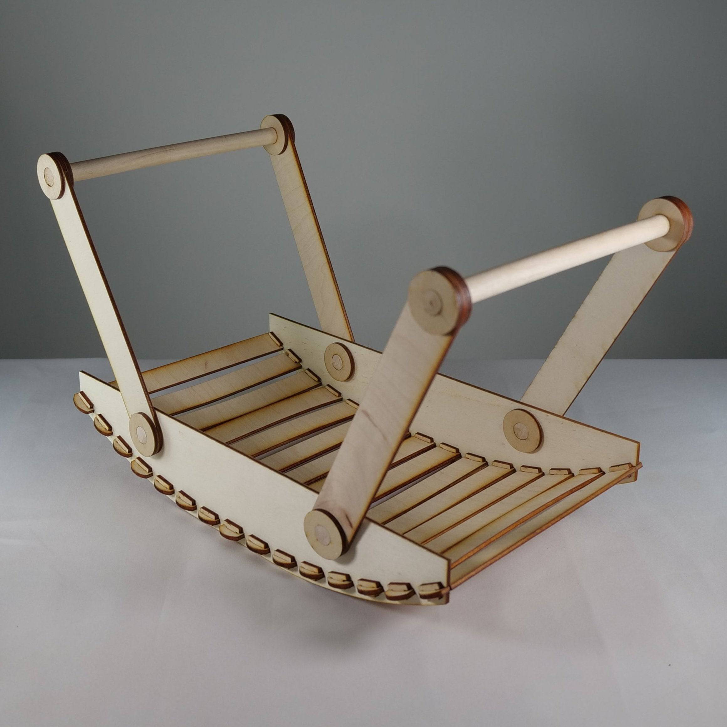 Curious Rabbit garden trug picnic basket flatpack model kit, showcasing a detailed wooden garden basket with handles and construction parts.
