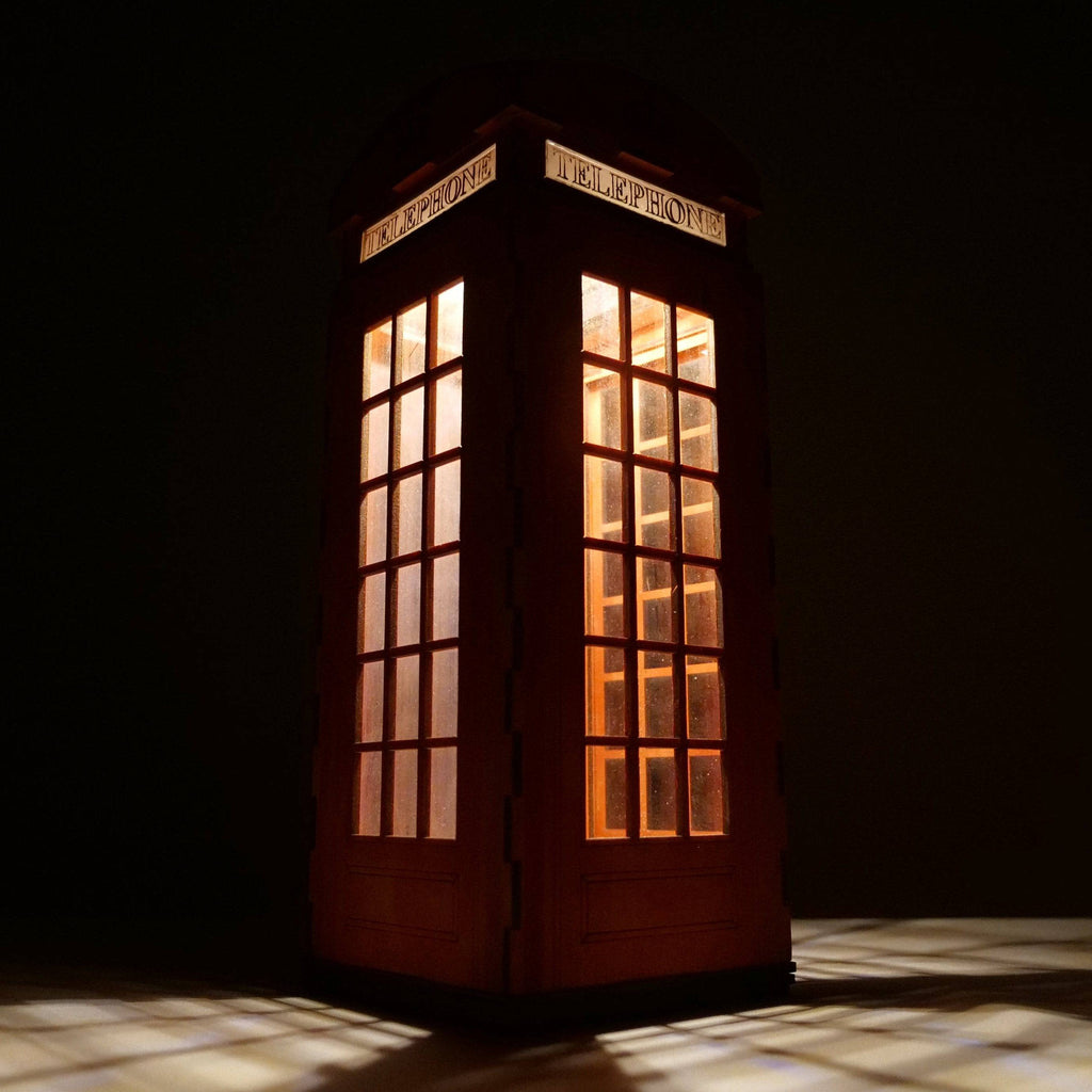 Curious Rabbit Telephone Box Lamp icon in flatpack model kit, showing a detailed red telephone booth lamp with black accents.