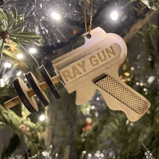 Vintage Ray Gun Bauble by Curious Rabbit, flatpack model kit, featuring a retro-style ray gun Christmas decoration.