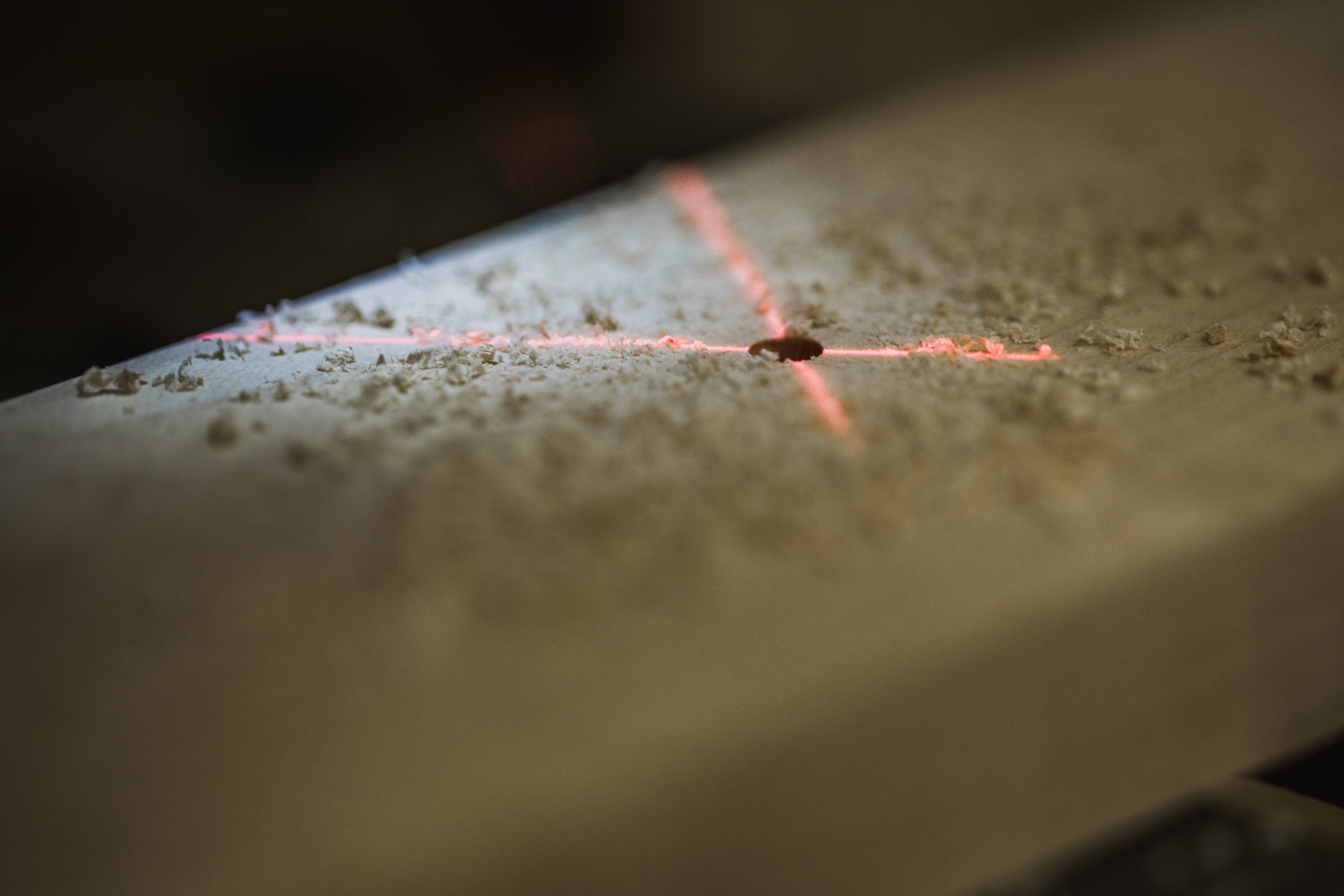 laser x marks the spot ona plank of wood
